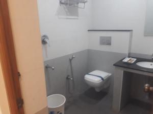 A bathroom at Kanmani Elite- A Perfect Home