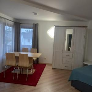 Un lugar para sentarse en AC-Ferienwohnung Wohn-Apartment