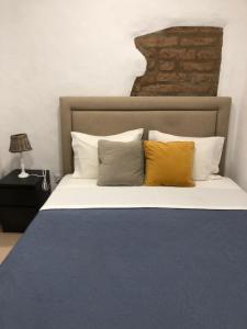 A bed or beds in a room at Recanto da Aldeia