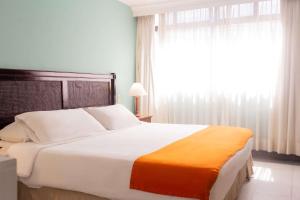 Hotel Faranda Express Puerta Del Sol Barranquilla, A Member of Radisson Individuals房間的床