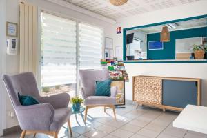 Зона вітальні в Comfort Aparthotel Nantes La Beaujoire