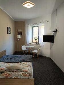 Postelja oz. postelje v sobi nastanitve Apartament Maja