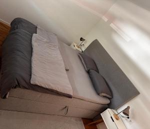 Tempat tidur dalam kamar di Luxus Apartment zum Wohlfühlen