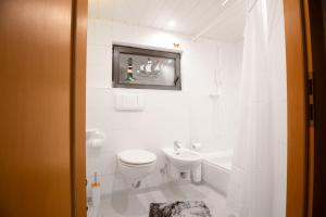 Un baño de Stilvolles 1,5-Zimmer-Apartment in Neckarsulm mit eigenem Parkplatz