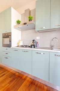 A kitchen or kitchenette at Wellness Apartment 25 min to Florence WiFi, Terrace