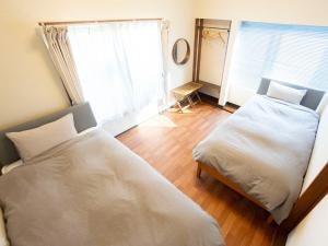 Postelja oz. postelje v sobi nastanitve WE HOME STAY Kamakura, Yuigahama - Vacation STAY 67085v