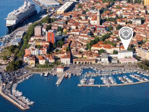 an aerial view of a harbor with boats in the water at Hotel Grand Koper in Koper