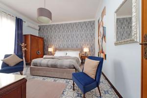 Кровать или кровати в номере Villa Gisi Guest House