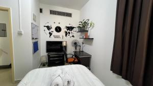 Giường trong phòng chung tại XD Sudio Apartment