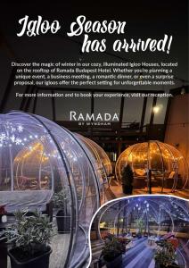 een advertentie voor een tuincentrum met planten in koepels bij Ramada by Wyndham Budapest City Center in Boedapest