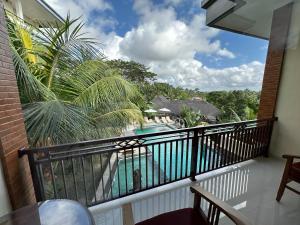 Poolen vid eller i närheten av Brata Cottage Ubud