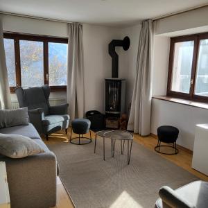 A seating area at Appartement Randogne avec grande terrasse