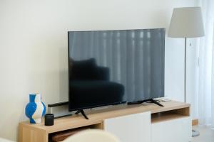 TV i/ili multimedijalni sistem u objektu Apartamento Lux 1882