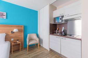 Una cocina o kitchenette en Appart’City Confort Vannes