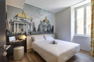 Lova arba lovos apgyvendinimo įstaigoje B&B Hotel Roma San Lorenzo Termini