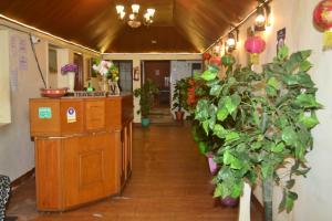 The lobby or reception area at Woods Paradise