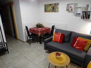 Кът за сядане в Apartamenty Tatrzańska Dolina