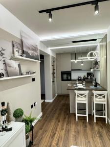 Una cocina o cocineta en Premium Line Apartman