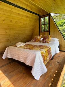 El Ensueño Ecohostal & Glamping 객실 침대