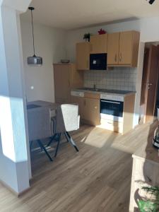 A kitchen or kitchenette at Appartement Heiss