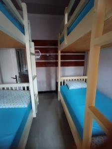 Una cama o camas en una habitación de gigafa homestay