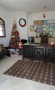 A seating area at Pousada Luar de Penedo