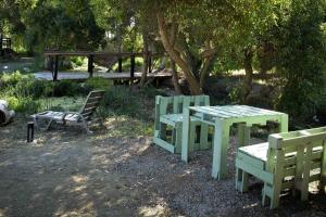 Um jardim em Casa humedal 2 habitaciones cercana a playa