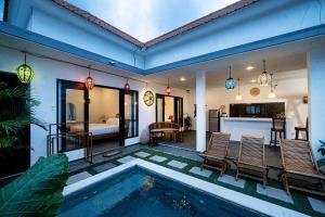 Et opholdsområde på Yolo 365 Villa, Canggu - Near Batu Bolong Beach, Canggu