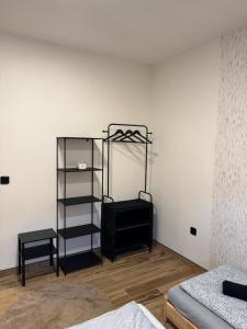 Кровать или кровати в номере j ONE Apartmány