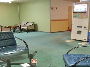 A seating area at Hotel Abest Aomori