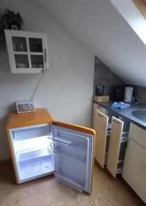 Kuchyň nebo kuchyňský kout v ubytování Ferienwohnung im roten Haus