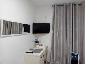 TV tai viihdekeskus majoituspaikassa Apartamento compartido excelente ubicación