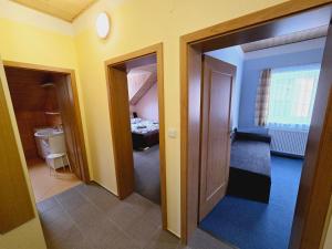 Gulta vai gultas numurā naktsmītnē Apartment Šumava Kaskady