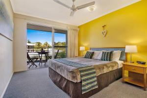 Krevet ili kreveti u jedinici u okviru objekta Ivory Palms Resort Noosa