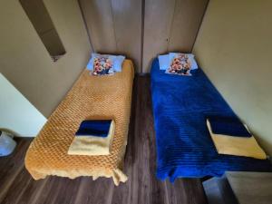 A bed or beds in a room at Travel House Wroclaw