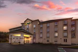 a rendering of a hotel with a parking lot at Quality Inn in Ottawa