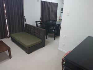 Tempat tidur dalam kamar di Lapus Honmachi No.200 / Vacation STAY 57908