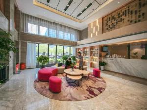 Lavande Hotel·Wuhan Qingshan Zhongyuan Plaza tesisinde bir oturma alanı