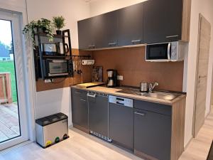 Dapur atau dapur kecil di Ferienhaus - Fimo Haus