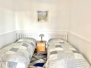 Una cama o camas en una habitación de Haus Jasmin