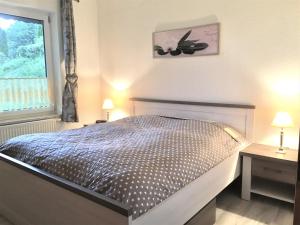 Una cama o camas en una habitación de Haus Jasmin