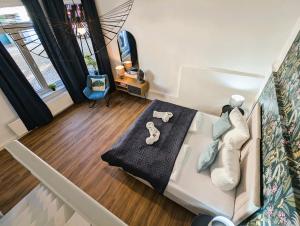 Una cama o camas en una habitación de BohnApartments - Topfmarkt XXL Suiten - NEU in TOP Zentrumslage, Vollausstattung, WLAN, Parkplätze