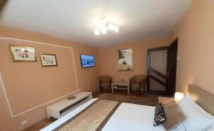 Ліжко або ліжка в номері Apartament Central