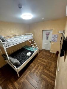 A bed or beds in a room at Hostel 5 Capsule rooms and appartment