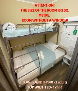 A bed or beds in a room at Hostel 5 Capsule rooms and appartment