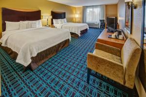 Postelja oz. postelje v sobi nastanitve Fairfield Inn and Suites by Marriott Naples