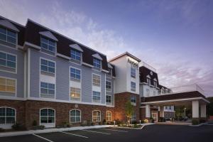 a rendering of a building with a parking lot at Fairfield Inn & Suites by Marriott South Kingstown Newport Area in South Kingstown