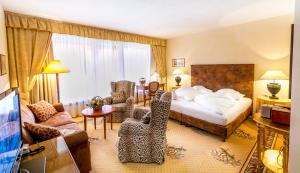 Lova arba lovos apgyvendinimo įstaigoje Dominik Alpine City Wellness Hotel - Adults only