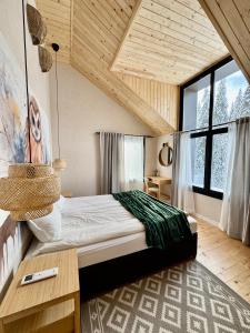 A bed or beds in a room at High Five Villas