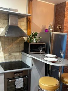 Una cocina o kitchenette en Kotedzas